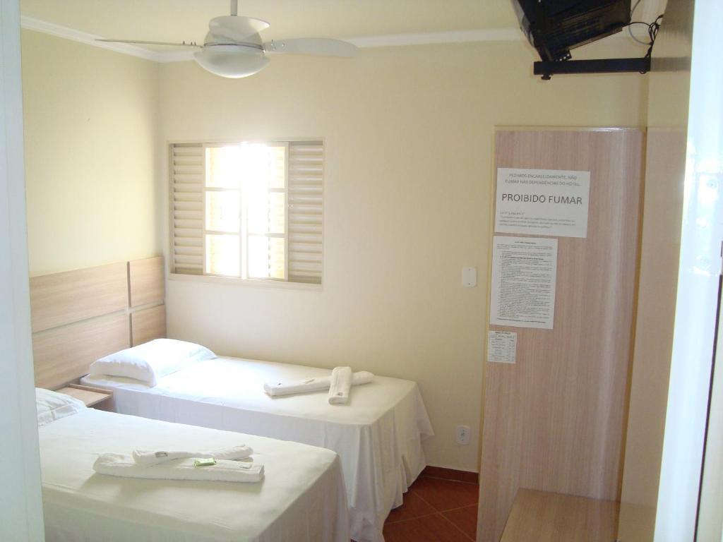 Hotel Perez Pouso Alegre Camera foto